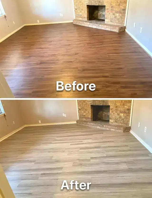Living room with a stone fireplace: dark vinyl plank replaced with grey-brown vinyl plank.